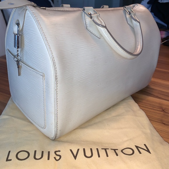 Louis Vuitton Handbags - LOUIS VUITTON ivory epi leather speedy
